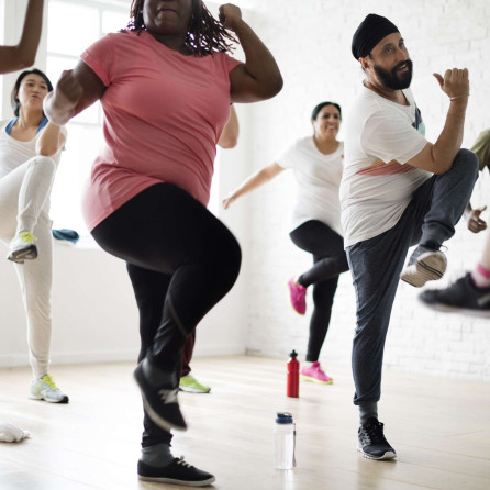 People exercising in a class together