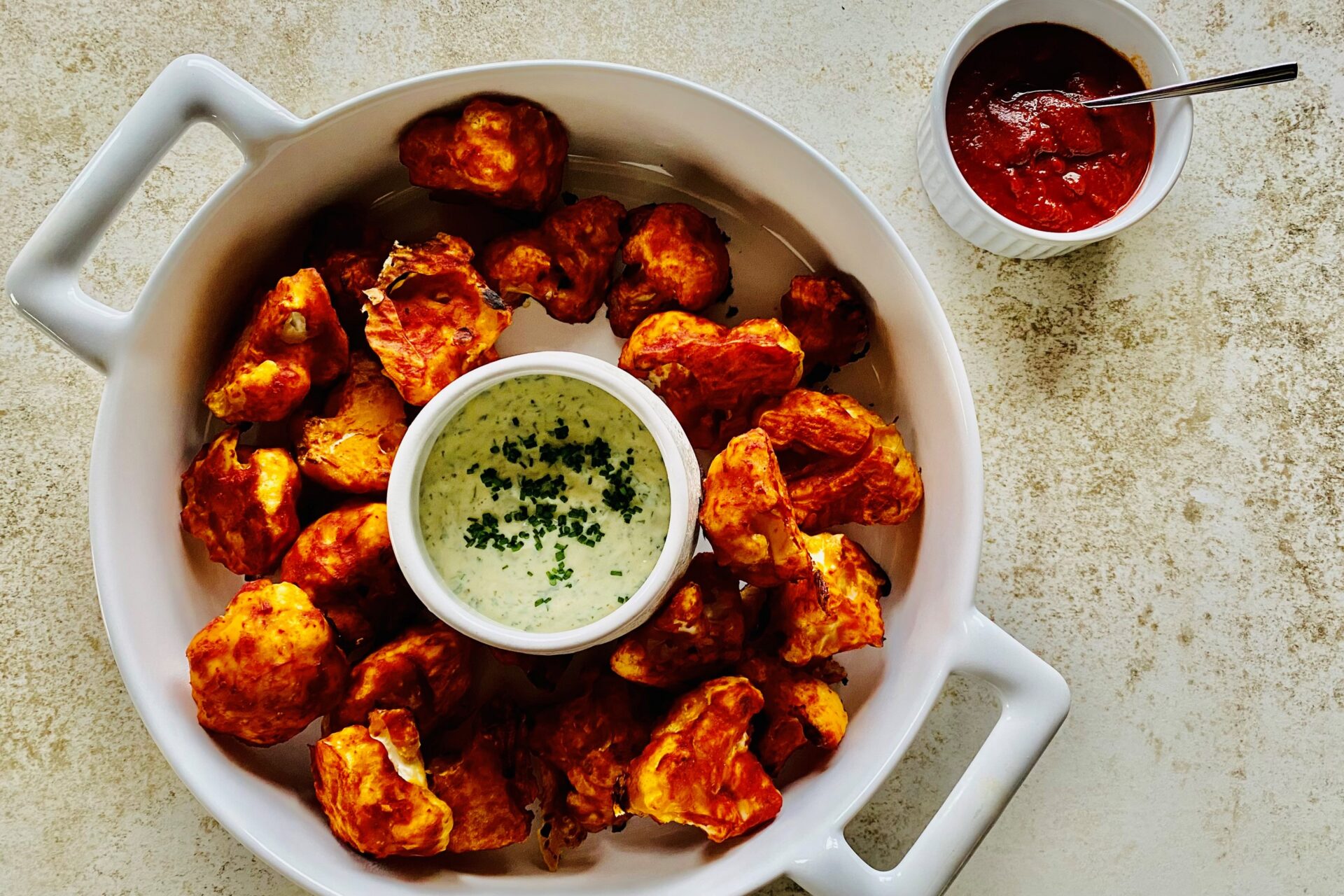 Buffalo Cauliflower Bites with Herby Dip